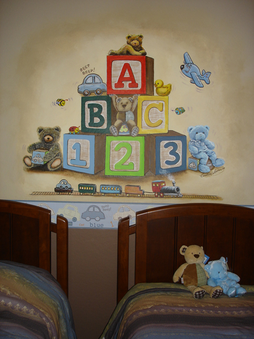 Hand-painted Baby blocks mural for Nursery by Caroline Woods